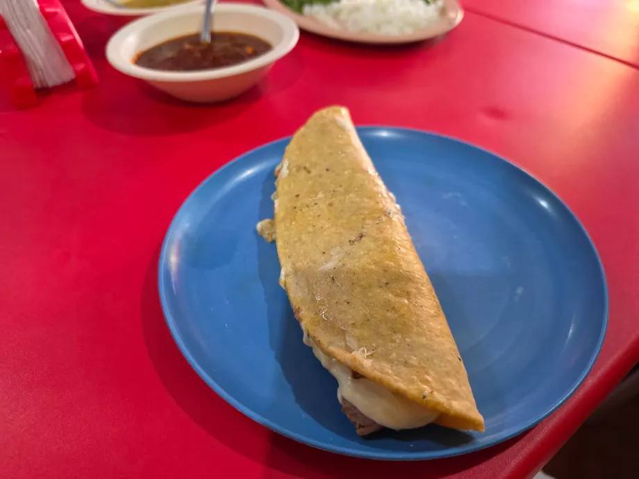 Berhenti untuk menikmati taco barbacoa
